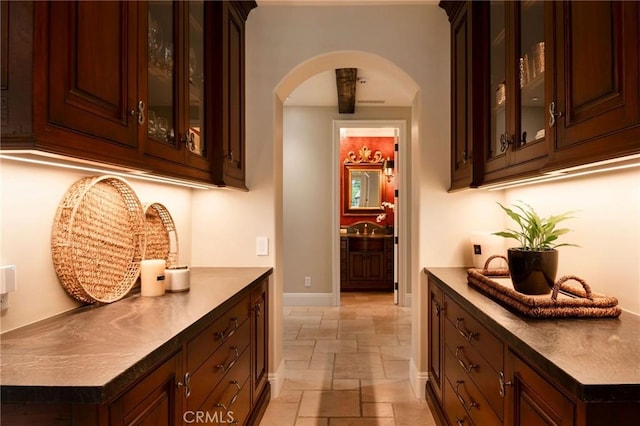 bar with dark brown cabinets