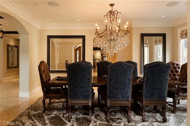 dining area with a notable chandelier and ornamental molding