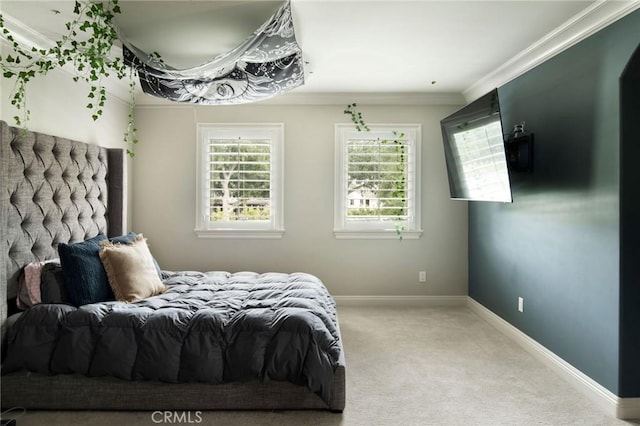 bedroom featuring carpet floors and ornamental molding