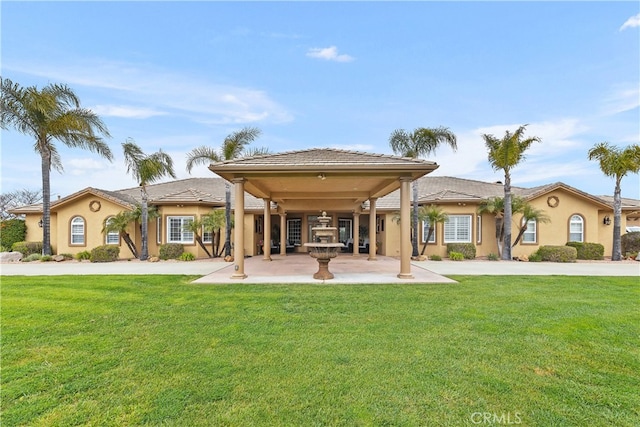 view of front of home with a front lawn