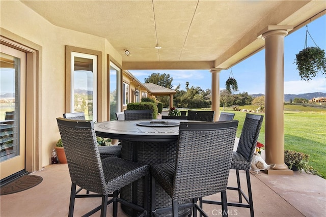 view of patio with a mountain view