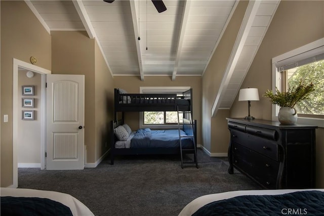 bedroom featuring vaulted ceiling with beams, dark carpet, multiple windows, and ceiling fan