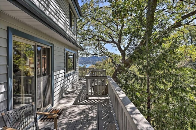 balcony with a deck with mountain view