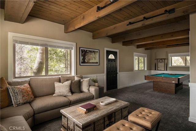 living room featuring wooden ceiling, beamed ceiling, dark carpet, and pool table