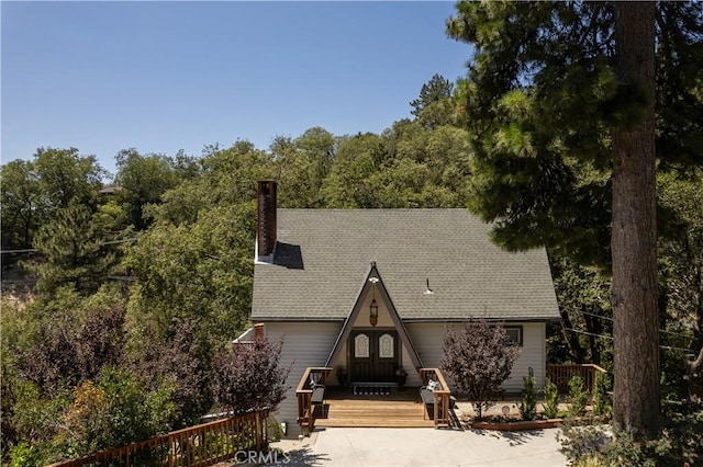 view of front facade featuring a wooden deck