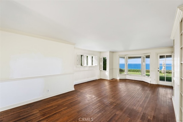 unfurnished living room featuring a water view, dark hardwood / wood-style floors, and crown molding