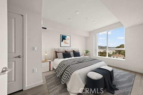 bedroom featuring hardwood / wood-style floors