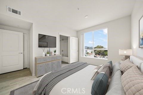 bedroom featuring light wood-type flooring