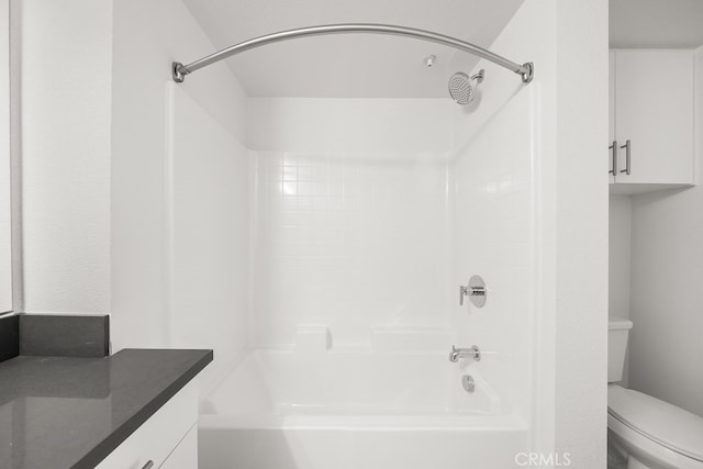 full bathroom with shower / washtub combination, vanity, and toilet