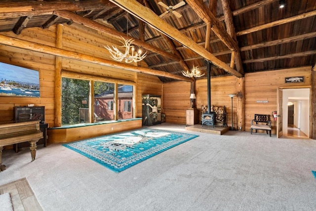 22228 Crestline Rd, Palomar Mountain, CA 92060 - misc room featuring wood walls, a wood stove, carpet flooring, high vaulted ceiling, and a chandelier
