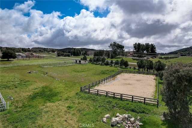 view of home's community featuring a mountain view and a rural view