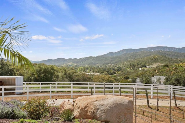 view of mountain feature with a rural view