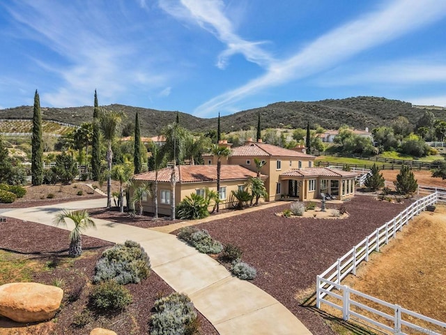 exterior space featuring a mountain view