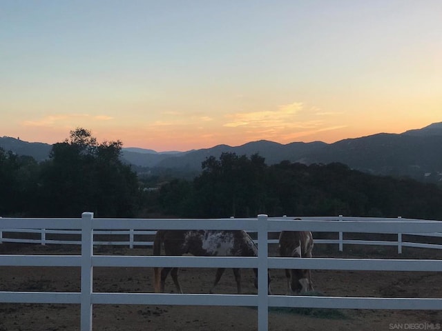 view of mountain feature with a rural view