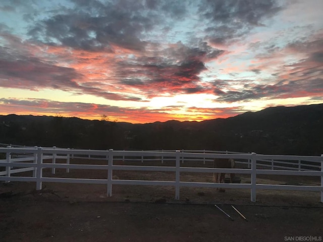 yard at dusk with a mountain view