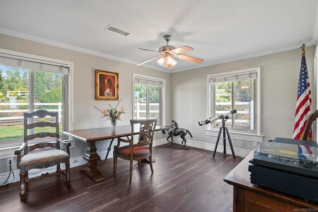 office space with ceiling fan, dark wood-type flooring, and crown molding