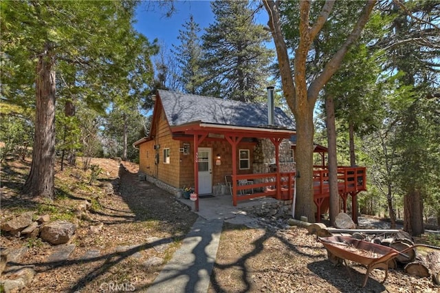 view of front of property with a deck