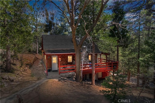 view of front of house with a deck