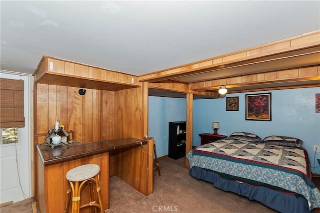 bedroom with dark colored carpet