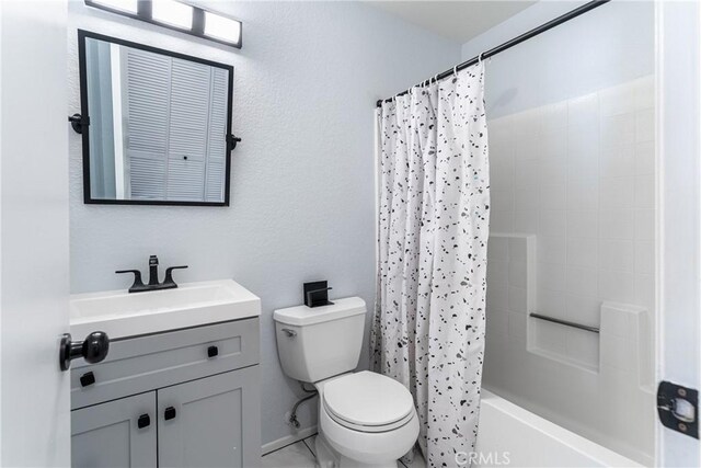 18840 Vista Del Canon Unit A, Newhall, CA 91321 - bathroom featuring toilet, vanity, and shower / bath combo with shower curtain