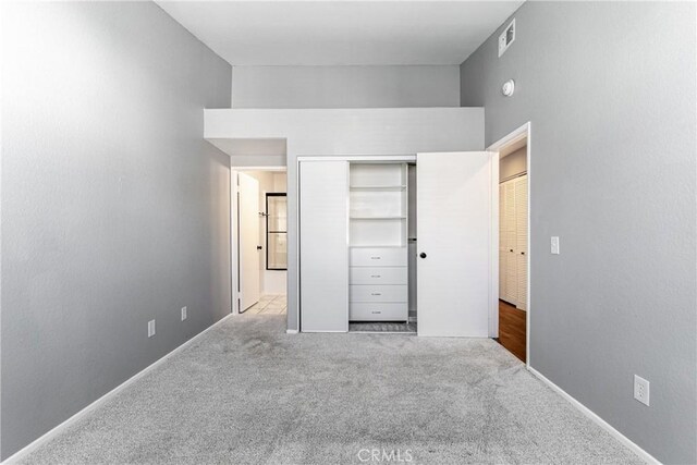 18840 Vista Del Canon Unit A, Newhall, CA 91321 - unfurnished bedroom featuring carpet floors, a closet, and baseboards