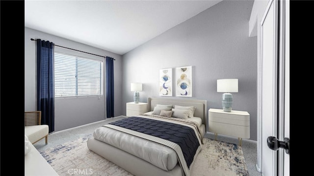 bedroom with lofted ceiling and carpet floors