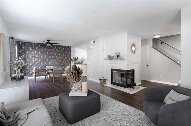 18840 Vista Del Canon Unit A, Newhall, CA 91321 - living area featuring an accent wall, a ceiling fan, wood finished floors, baseboards, and wallpapered walls