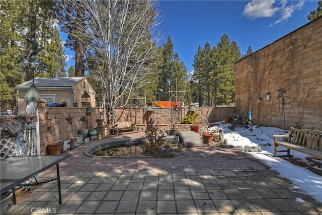 view of snow covered patio