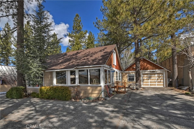 view of front of property with a garage