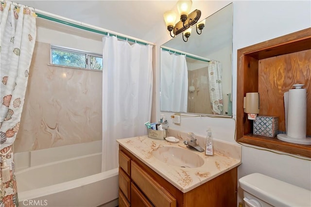 bathroom featuring toilet, shower / tub combo, and vanity