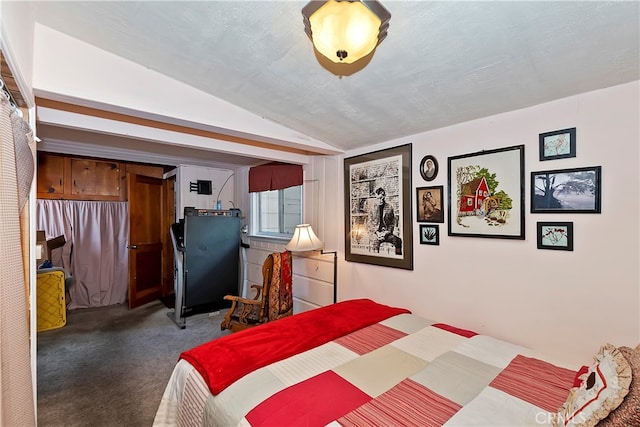 carpeted bedroom featuring vaulted ceiling and a textured ceiling