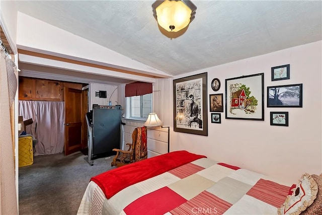 carpeted bedroom with vaulted ceiling