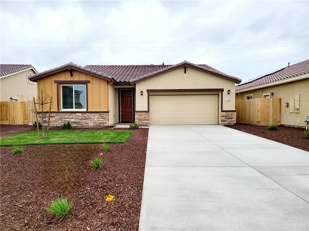 view of front of property with a garage