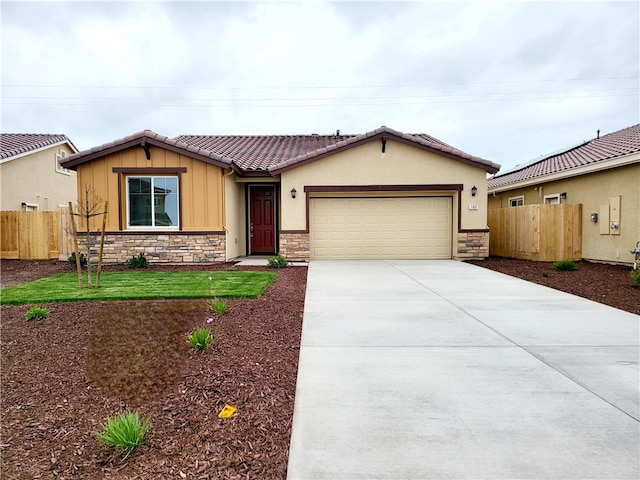 view of front of property with a garage