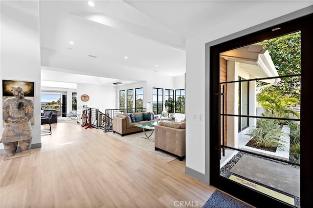 17 Monaco, Newport Beach, CA 92660 - living room featuring light wood-type flooring and recessed lighting