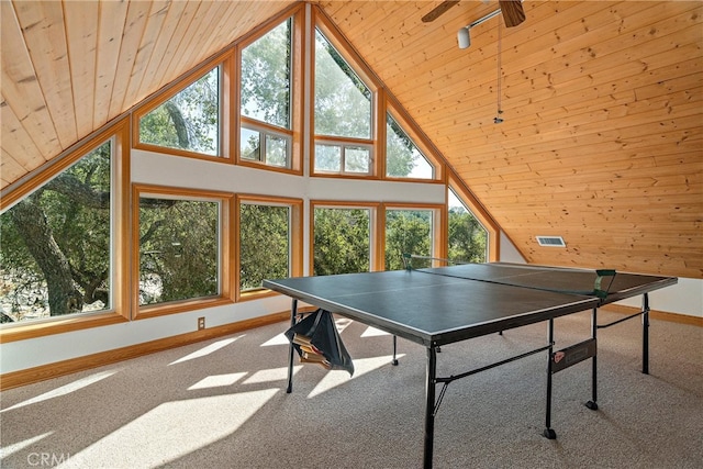 playroom featuring ceiling fan, carpet floors, and wood ceiling