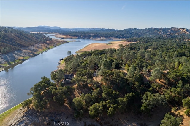 bird's eye view with a water and mountain view