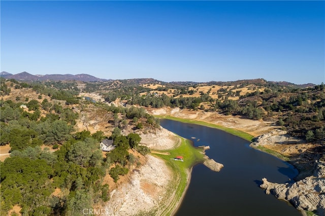 bird's eye view with a water and mountain view