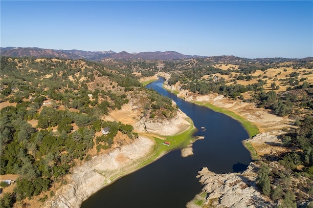 bird's eye view featuring a water and mountain view