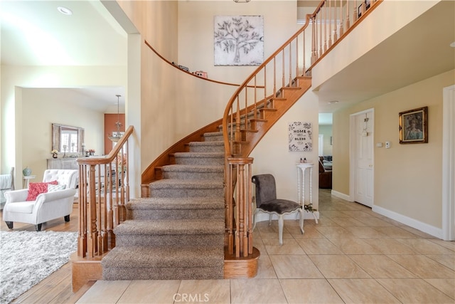 stairway featuring wood-type flooring