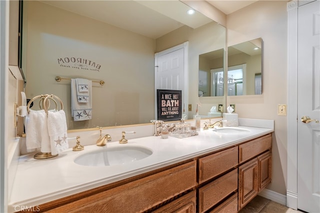 bathroom featuring tile patterned floors and vanity