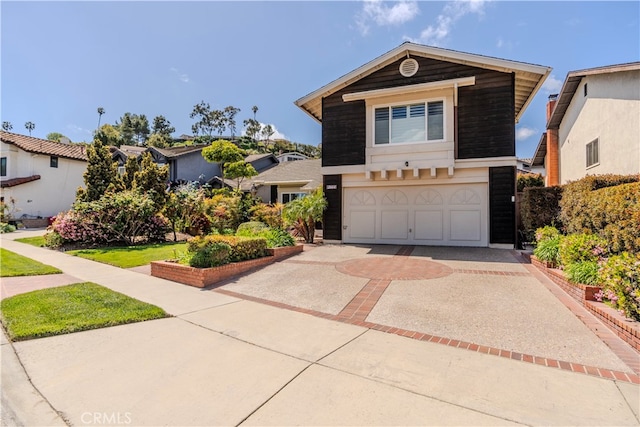 front of property with a garage