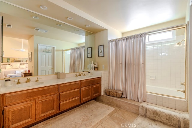 bathroom with shower / tub combo with curtain, vanity, and tile patterned floors