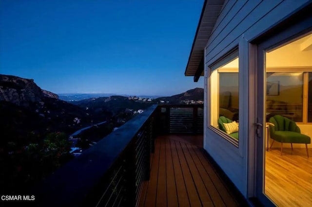 balcony featuring a mountain view