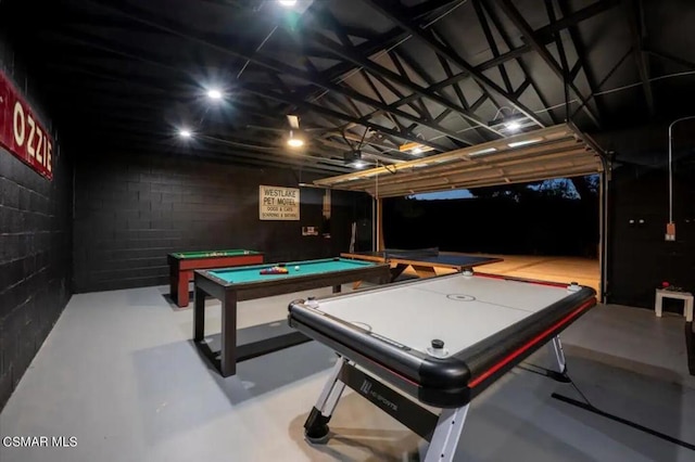 rec room featuring concrete floors and billiards