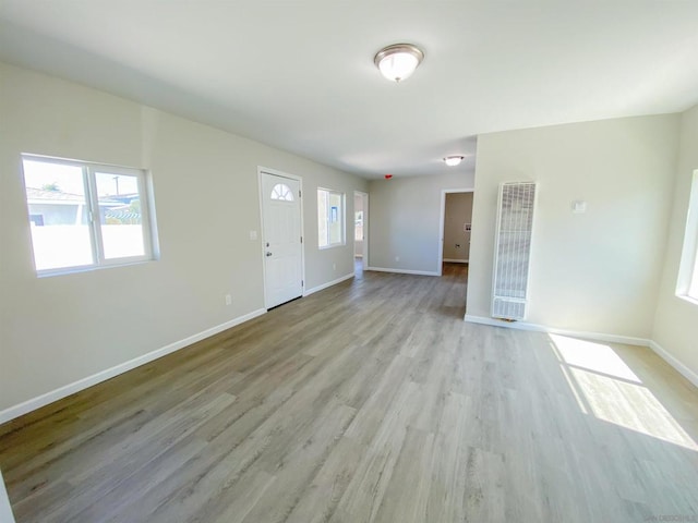 entrance foyer featuring light hardwood / wood-style floors