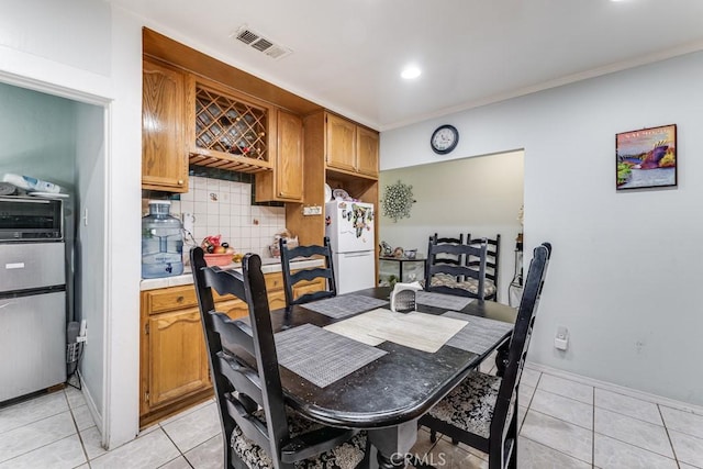 dining room with light tile patterned floors