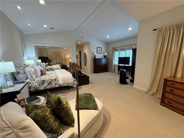 carpeted bedroom with vaulted ceiling with beams