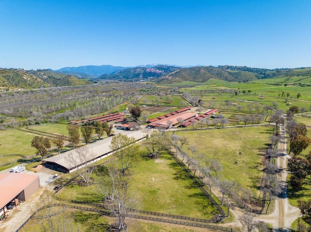 aerial view with a mountain view and a rural view