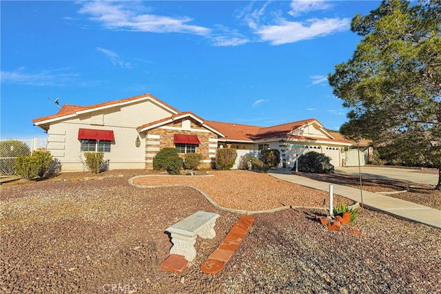 ranch-style home with a garage